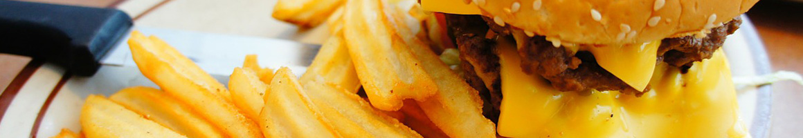 Eating American (New) Burger at Moxie Burger restaurant in Marietta, GA.